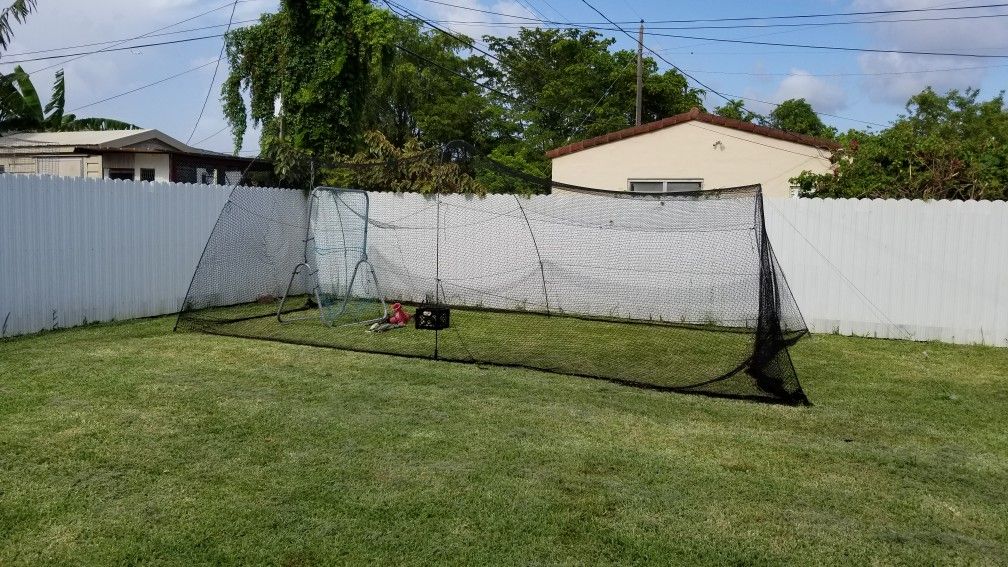 Batting cage, pitching machine and miscellaneous accessories