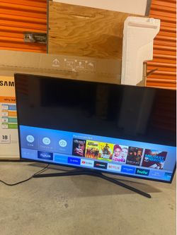 Samsung 50” Class KU 6 series 4k UHD Crystal smart tv with Bluetooth Sound Bar and Powered Subwoofer.