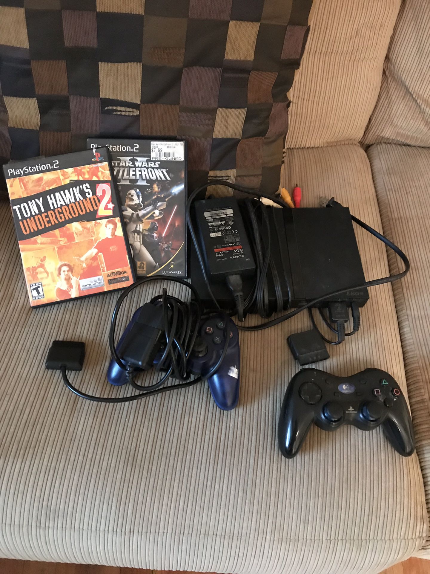 PlayStation 2 with 2 games