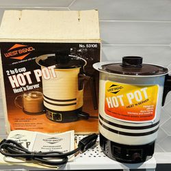 New old stock unused Vintage 1979 West Bend HOT POT Heat & Server 2 to 6 Cup #53106 Almond color with brown striped accents.  Includes original box 