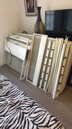 Twin bed frame $50 , twin mattress (free) , 6” bed risers (4) $20