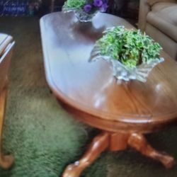 Vintage oak coffee table and 2 in tables claw feet in tables fold down on each side.They're all perfect