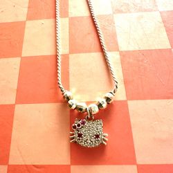 Amazing hello kitty diamond necklace very cool and rare silver chain and diamonds very rare and cool for kids teens and adults 