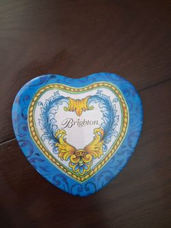 Vintage Brighton hear tin