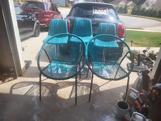 3 bar stools and 2 patio chairs