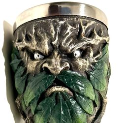 Green Man-themed goblet or chalice, widely available from retailers specializing in gothic, fantasy, or Wiccan decor. It is typically a decorative pie