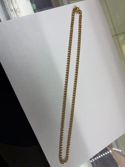 14K YELLOW  GOLD CUBAN CHAIN, 22”