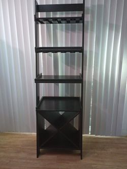 Black ladder style wine shelf/rack/bookshelf cash only,