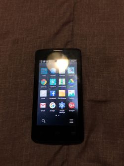 Small touch screen ZTE phone.