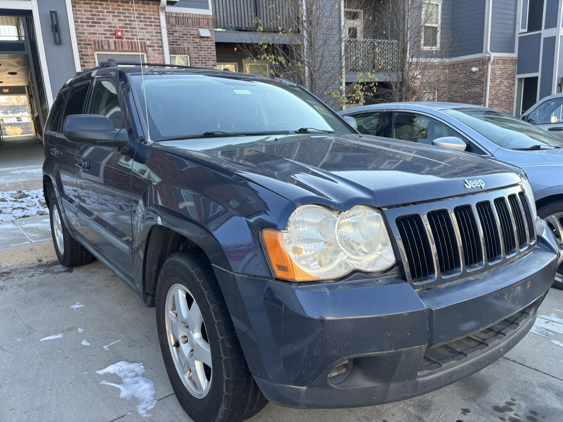 2009 Jeep Grand. Cherokee Laredo Sport utility  4 door V6 3.7 liter 2WD automatic 159k miles runs and drives good just put a brand new battery   ac he