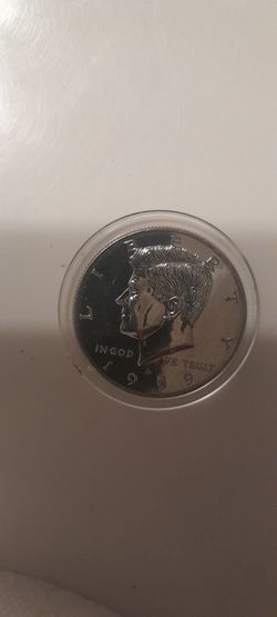 1999 D KENNEDY HALFDOLLAR  EXACT SAME MIRROR FINISH AS PROOF AND ALL COPPER REEDING READ NOTES