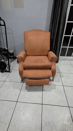 Pair of reclining wing back chairs