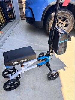 KNEE Scooter.  Plush Seat pad, left /ride side Brake Handles. 300lb. Weight Limit. New.