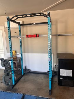 Squat Rack with Barbell and Weights