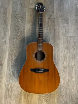 Takamine GS330S Dreadnought Solid Cedar top guitar.