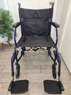 Carex Transport Wheelchair With 19 inch Seat, Folding Transport Chair with Foot Rests