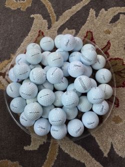 50 Titleist Golf Balls- great condition (35 Pro V1/v1x, 15 Velocity)