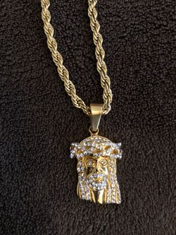 Gold chain and charm (will not tarnish or fade) 24”