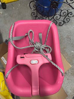Pink toddler swing
