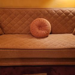 Quilted fabric sofa bed in Teraccota  $300