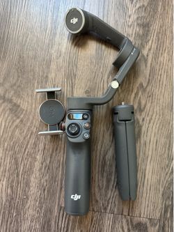 DJI OM 6 Smartphone Gimbal Stabilizer + Tripod Grip – Excellent