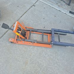 Motorcycle jack, but adapted For Heaving Jill, to raise /lift anything heavy, Even Your Spirit