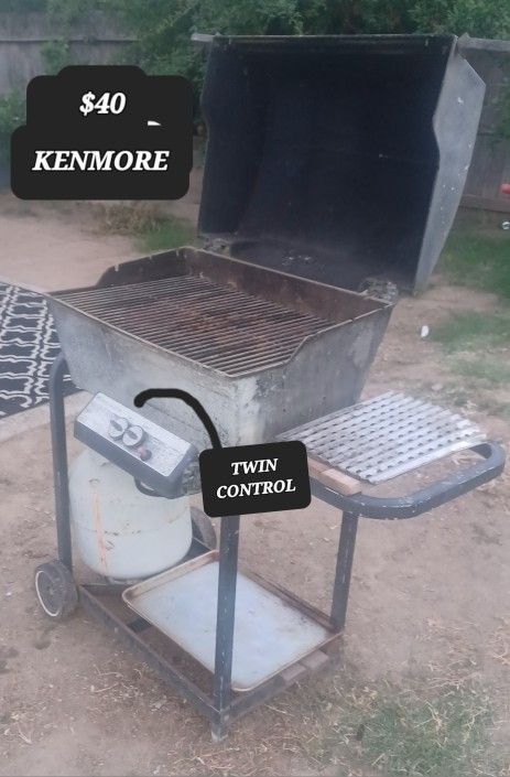 KENMORE TWIN CONTROL PROANE BBQ GRILL WITH KART. DON'T LET THE PRICE FOOL YOU. THIS IS A GOOD BBQ