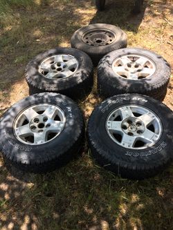 Full set of dodge tires and rims with spare