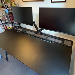 2 27" LG computer monitors with desk arms