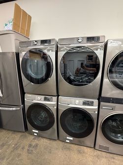 Brand new Samsung Stainless Steel front load washer and gas dryer set