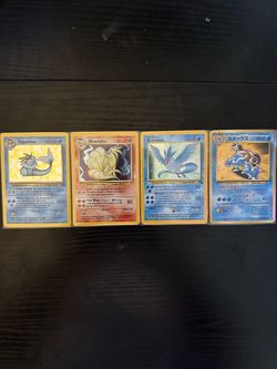 Vintage Pokémon TCG Cards – Vaporeon, Ninetales, Articuno & Blastoise