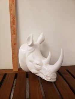 Ceramic gloss white rhinoceros head.