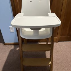 Wood High Chair With White Plastic Seat