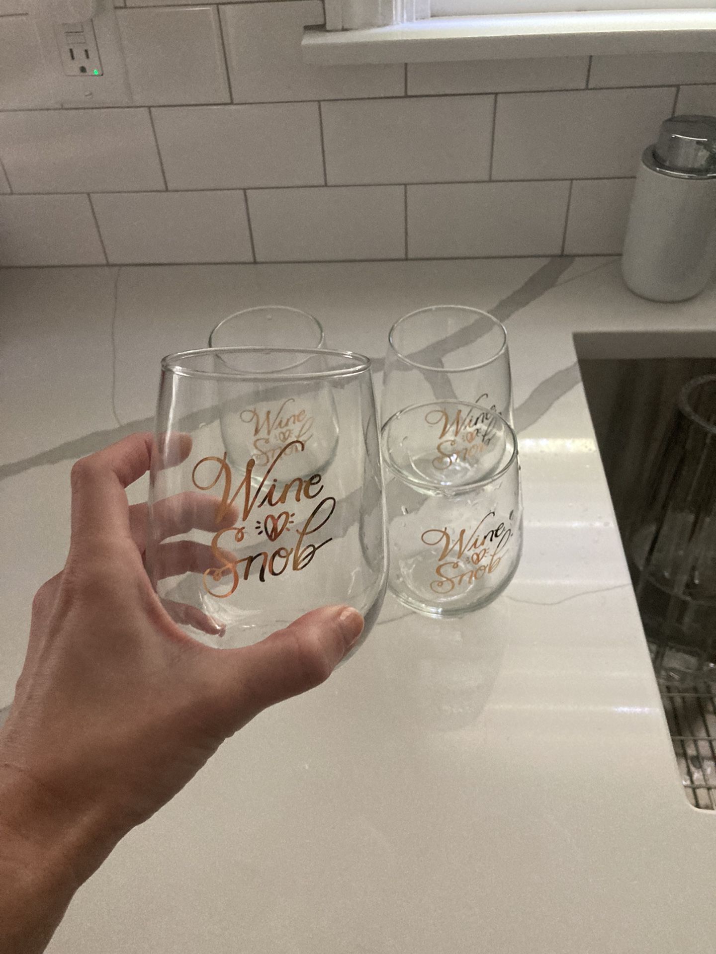 Set of 4 adorable wine glass glasses never used “wine snob” In gold lettering 