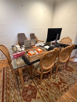 Glass Top Dining Table with Cane Chairs Set