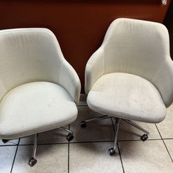 Pair Of Rolling chairs 