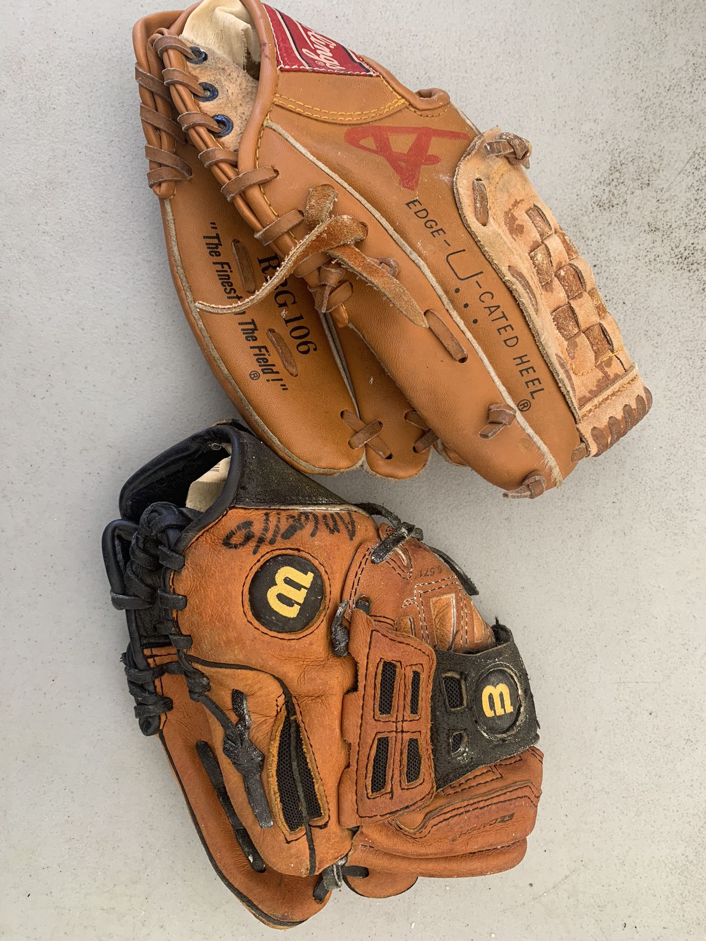 Two  T -Ball Baseball Gloves One  Rawlings & Wilson