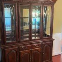 vintage wooden china cabinet or buffet hutch