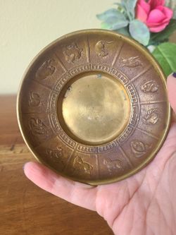 Vintage brass Chinese zodiac trinket tray or candle holder