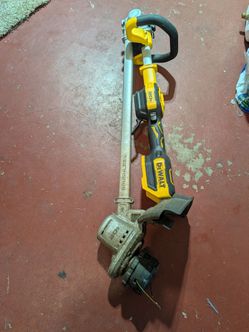 DeWalt weed-eater/string trimmer. (Tool only battery not included)
