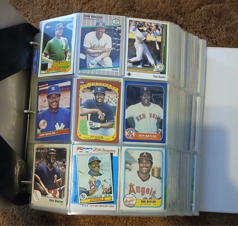 Binders of sports cards.