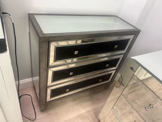 Silver and black dresser