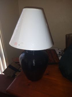 Lamp like new was brand new white shade still in the wrap