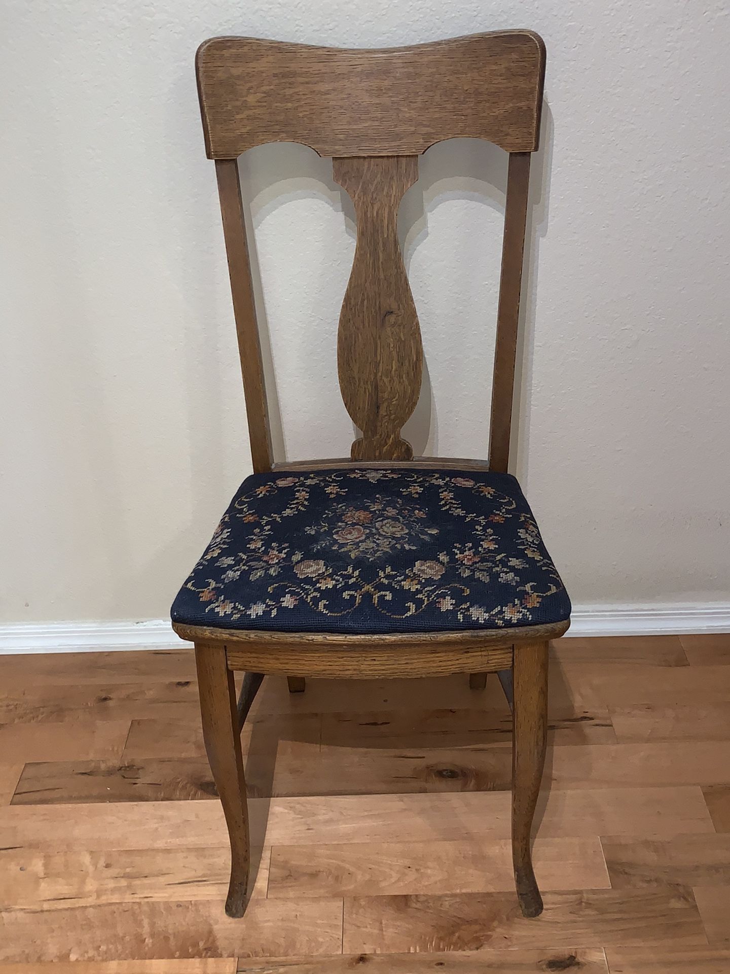 Antique side chair. Needlepoint seat.