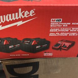 Milwaukee 2 5.0 batteries and charger