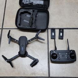 E88 Drone, 2 Batteries, Carry Case. New