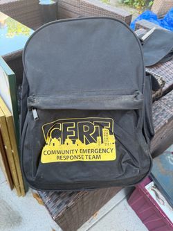 Vintage CERT Community Emergency Response Team Backpack with items inside