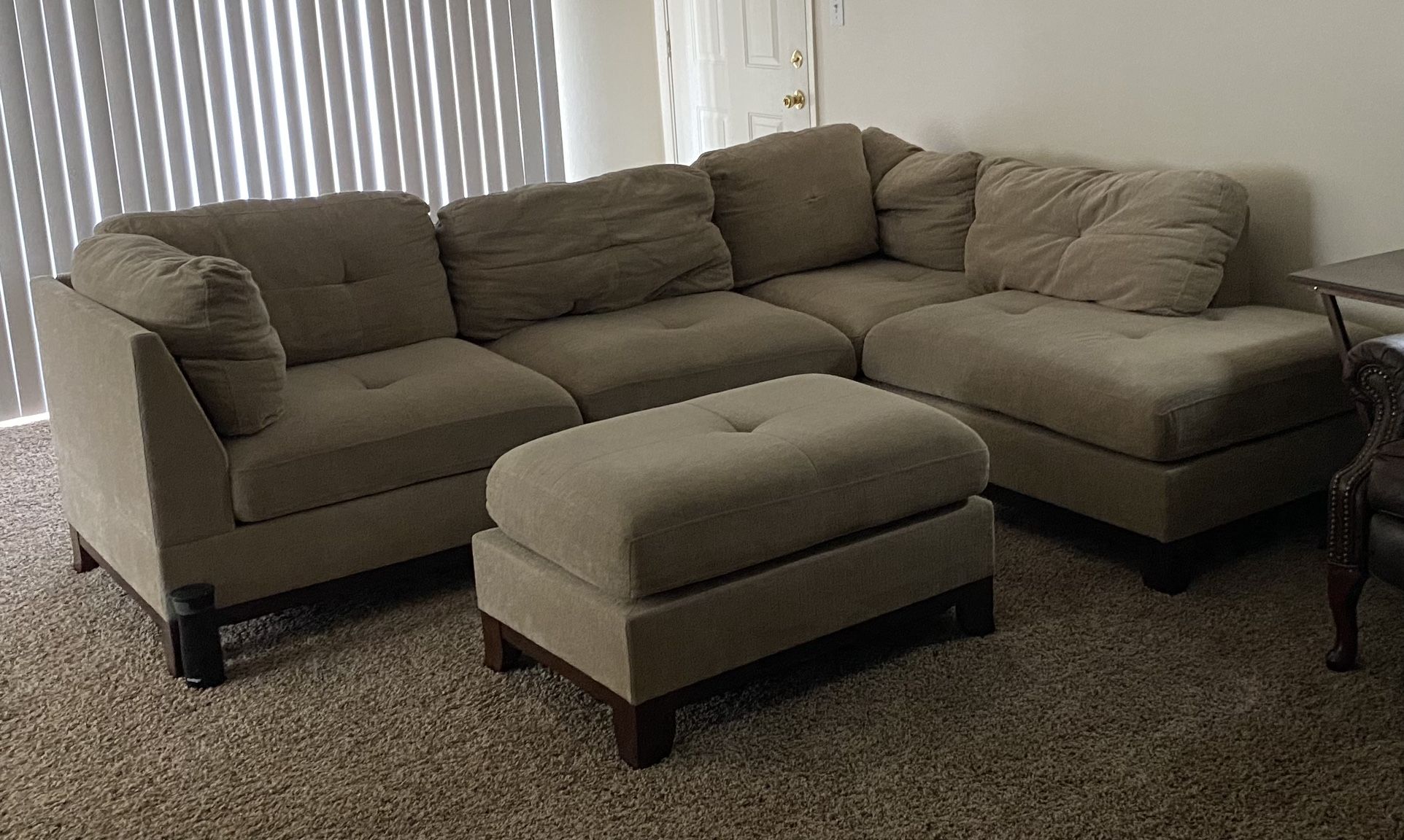 Beige L - Shaped Couch With Ottoman 