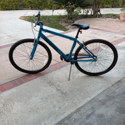 Mongoose HCX rigid-frame bicycle.