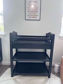 Free: Black changing table with ample storage